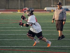 wesleyan lacrosse battling bishops